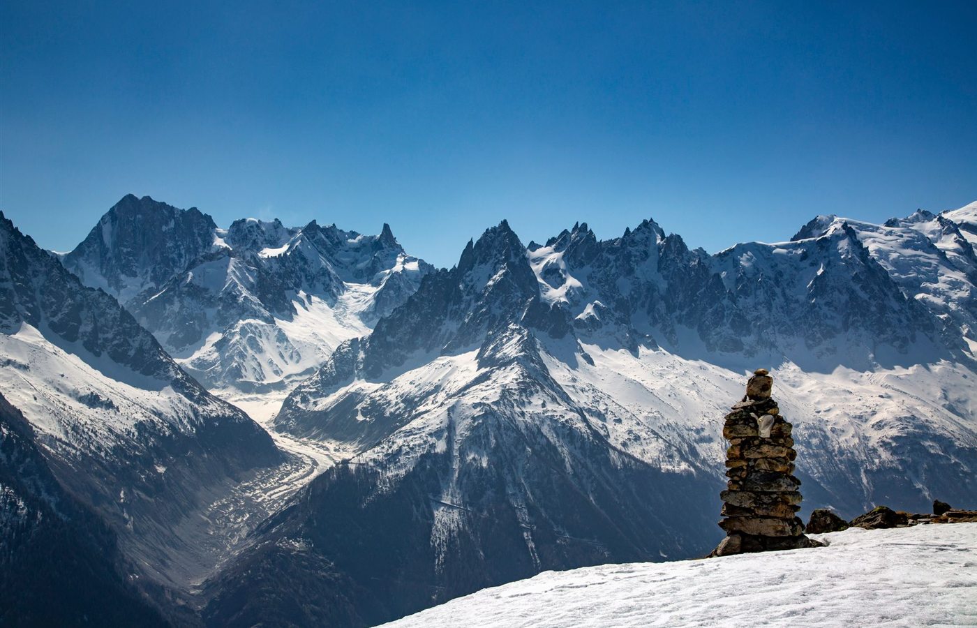 Explore the majestic snow-capped peaks of the French Alps with breathtaking mountain views.